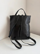 Marks and Spencer black with gold hardware leather backpack