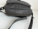 Black Leather Crossbody Bag with Buckle Detail and Patterned Interior