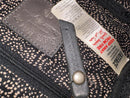 Black Leather Crossbody Bag with Buckle Detail and Patterned Interior