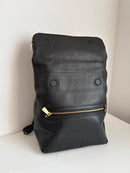 Marks and Spencer black with gold hardware leather backpack