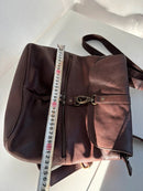 Brown Leather Backpack with Front Zip Pocket and Buckle Closure