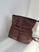 Brown Leather Backpack with Front Zip Pocket and Buckle Closure