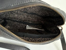 Black Leather Crossbody Bag with Buckle Detail and Patterned Interior