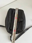 Black Leather Crossbody Bag with Buckle Detail and Patterned Interior
