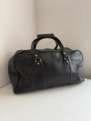 Marks and Spencer black duffel, hold-all leather bag