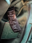 Accessorize leather bag