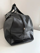 Marks and Spencer black duffel, hold-all leather bag
