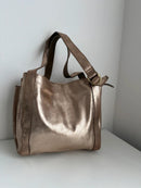 White stuff gold leather handbag
