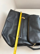 Marks and Spencer black with gold hardware leather backpack