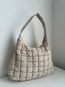 Beige Quilted Shoulder Bag with Padded Strap and Zipper Closure