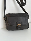 Black Leather Crossbody Bag with Buckle Detail and Patterned Interior
