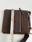 Brown Leather Crossbody Bag with Front Pocket and Adjustable Strap