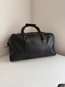 Marks and Spencer black duffel, hold-all leather bag