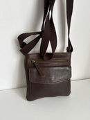 Brown Leather Crossbody Bag with Front Pocket and Adjustable Strap